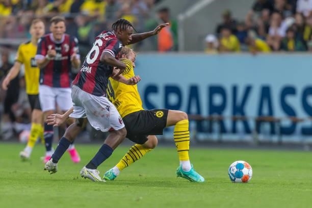 Kingsley Michael of FC Bologna and Julian Brandt of Borussia Dortmund battle for the ball during the Preseason Friendly Match between Borussia...