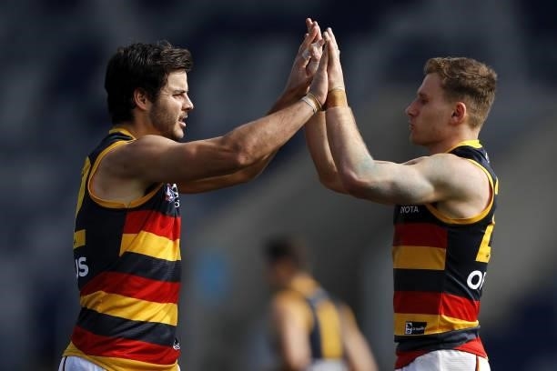 Darcy Fogarty of the Crows celebrates a goal with Rory Laird of the Crows during the 2021 AFL Round 20 match between the Western Bulldogs and the...