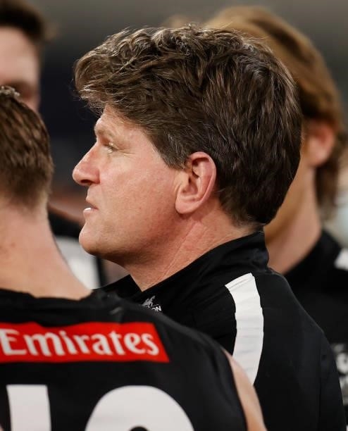 Robert Harvey, Interim Senior Coach of the Magpies addresses his players during the 2021 AFL Round 20 match between the Collingwood Magpies and the...