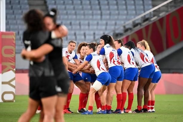 France's players react after losing the women's final rugby sevens match between New Zealand and France during the Tokyo 2020 Olympic Games at the...