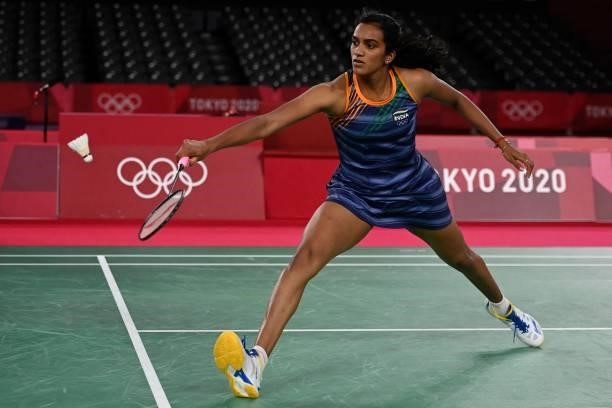 India's P. V. Sindhu hits a shot to Taiwan's Tai Tzu-ying in their women's singles badminton semi-final match during the Tokyo 2020 Olympic Games at...