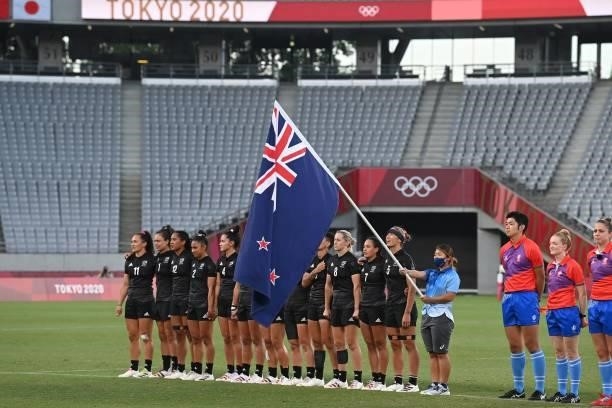 New Zealand's players sing the national anthem before the women's final rugby sevens match between New Zealand and France during the Tokyo 2020...
