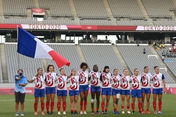 France's players sing the national anthem before the women's final rugby sevens match between New Zealand and France during the Tokyo 2020 Olympic...