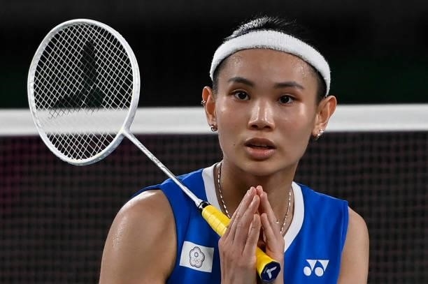 Taiwan's Tai Tzu-ying celebrates after beating India's P. V. Sindhu in their women's singles badminton semi-final match during the Tokyo 2020 Olympic...
