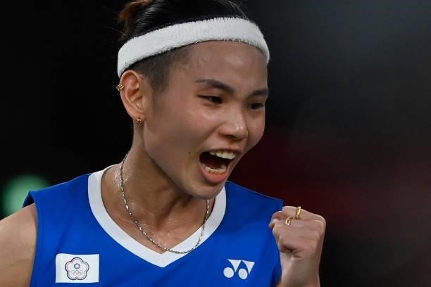 Taiwan's Tai Tzu-ying reacts after a point with India's P. V. Sindhu in their women's singles badminton semi-final match during the Tokyo 2020...