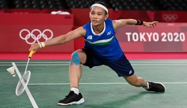 Taiwan's Tai Tzu-ying hits a shot to India's P. V. Sindhu in their women's singles badminton semi-final match during the Tokyo 2020 Olympic Games at...