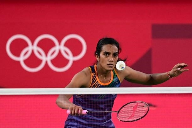 India's P. V. Sindhu hits a shot to Taiwan's Tai Tzu-ying in their women's singles badminton semi-final match during the Tokyo 2020 Olympic Games at...