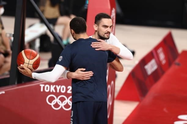Zach LaVine of the USA Men's National Team hugs Tomas Satoransky of the Czech Republic Men's National Team before the game during the 2020 Tokyo...