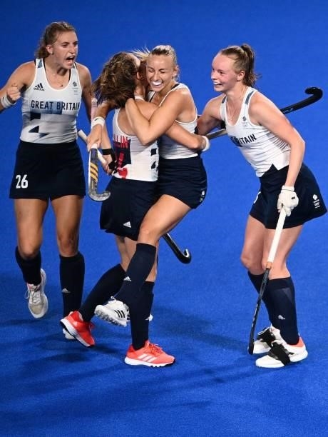 Britain's Hannah Martin celebrates with teammates after scoring against Ireland during their women's pool A match of the Tokyo 2020 Olympic Games...