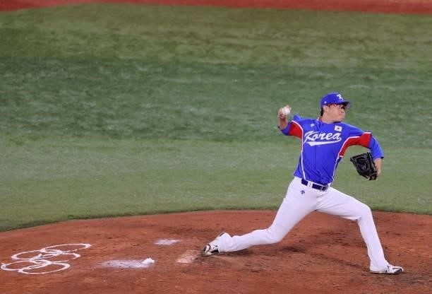 South Korea's relief pitcher Park Sewoong hurls the ball during the eighth inning of the Tokyo 2020 Olympic Games baseball opening round group B game...