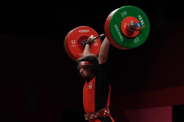 Canada's Boady Robert Santavy competes in the men's 96kg weightlifting competition during the Tokyo 2020 Olympic Games at the Tokyo International...