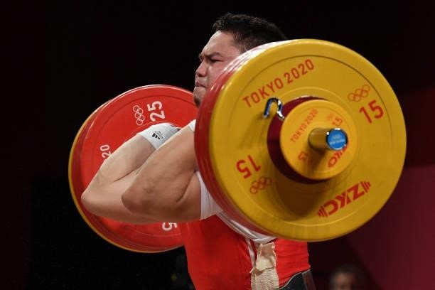 Kyrgyzstan's Bekdoolot Rasulbekov competes in the men's 96kg weightlifting competition during the Tokyo 2020 Olympic Games at the Tokyo International...