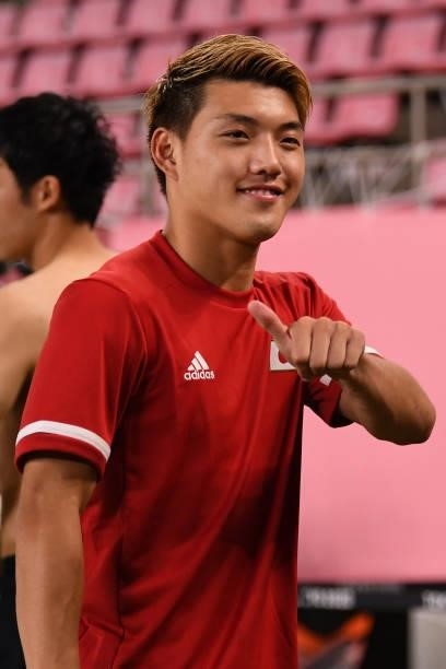 Ritsu Doan of Japan poses for photographers after the win during the Men's Quarter Final match on day eight of the Tokyo 2020 Olympic Games at...