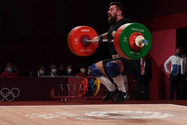 Belarus' Yauheni Tsikhantsou competes in the men's 96kg weightlifting competition during the Tokyo 2020 Olympic Games at the Tokyo International...