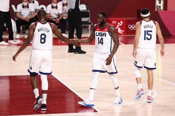 Draymond Green hi-fives Khris Middleton of the USA Men's National Team during the game against the Czech Republic Men's National Team during the 2020...
