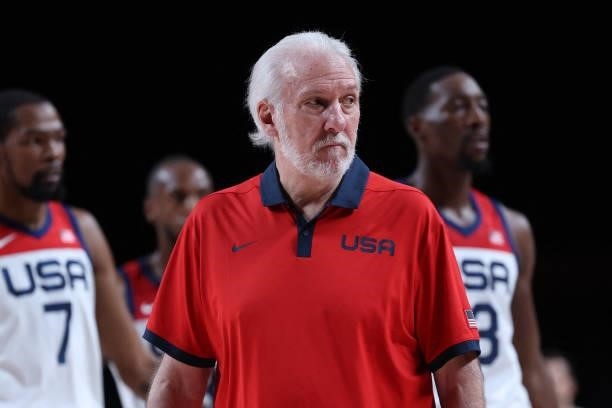 S team coach Gregg Popovich watches the men's preliminary round group A basketball match between USA and Czech Republic during the Tokyo 2020 Olympic...