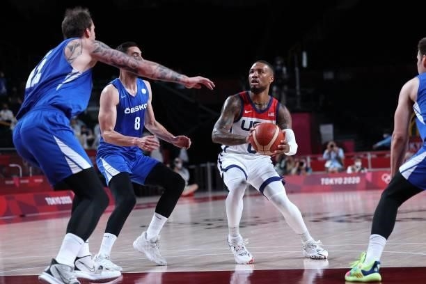 S Damian Lillard prepares to shoot the ball in the men's preliminary round group A basketball match between USA and Czech Republic during the Tokyo...