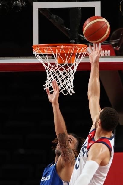 S Zachary Lavine goes to the basket past Czech Republic's Blake Schilb in the men's preliminary round group A basketball match between USA and Czech...