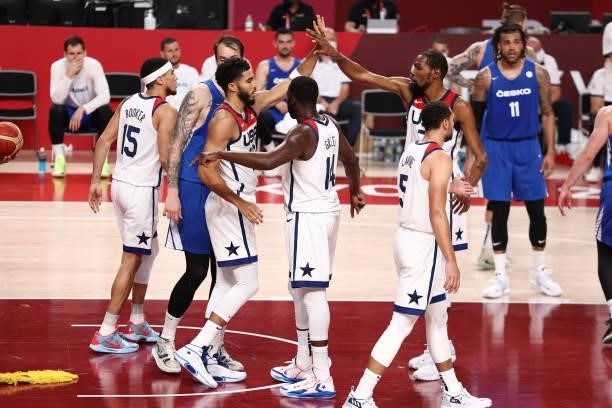 Kevin Durant and Draymond Green hi-five Jayson Tatum of the USA Men's National Team during the game against the Czech Republic Men's National Team...