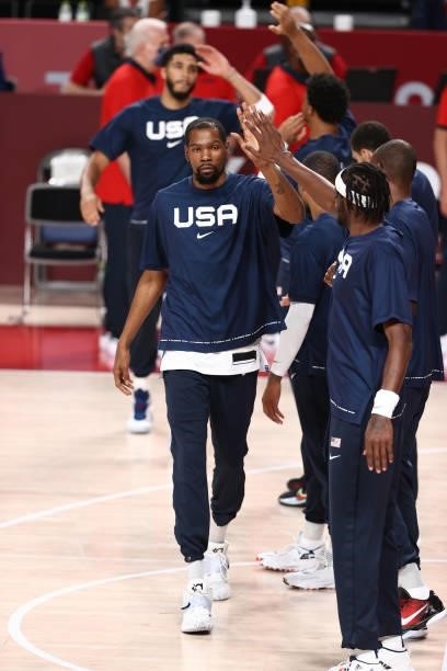 Kevin Durant of the USA Men's National Team hi-fives his teammates before the game against the Czech Republic Men's National Team during the 2020...