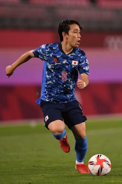 Koji Miyoshi of Japan dribbles the ball during the Men's Quarter Final match against Team New Zealand on day eight of the Tokyo 2020 Olympic Games at...