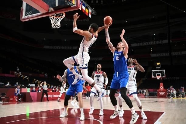 S Jayson Tatum goes to the basket past Czech Republic's Ondrej Balvin in the men's preliminary round group A basketball match between USA and Czech...