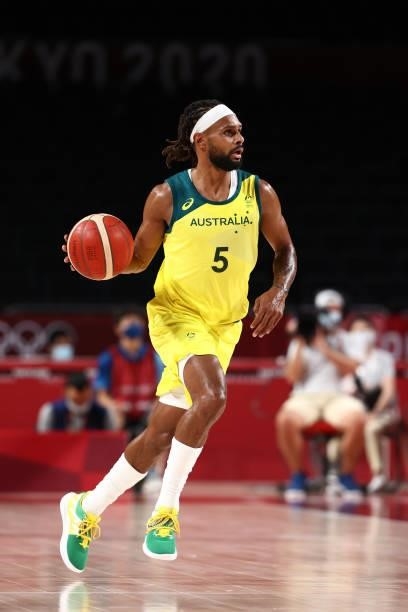 Patty Mills of the Australia Men's National Team dribbles the ball against Germany Men's National Team during the 2020 Tokyo Olympics on July 31,...