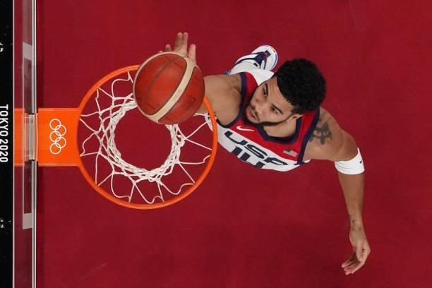 S Jayson Tatum goes to the basket in the men's preliminary round group A basketball match between USA and Czech Republic during the Tokyo 2020...