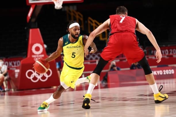 Patty Mills of the Australia Men's National Team drives to the basket against Germany Men's National Team during the 2020 Tokyo Olympics on July 31,...