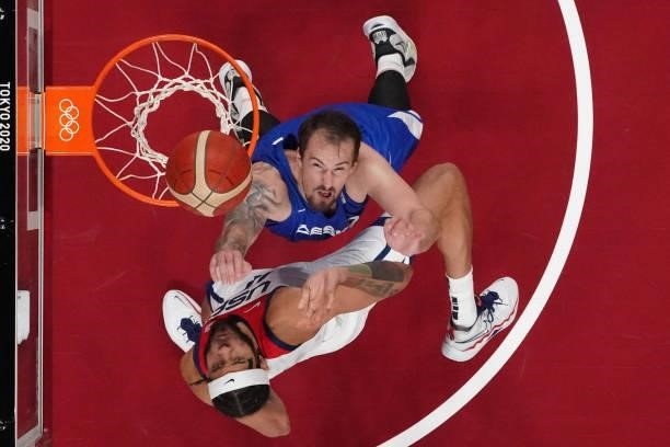 S Javale Mc Gee and Czech Republic's Ondrej Balvin look at the basket in the men's preliminary round group A basketball match between USA and Czech...