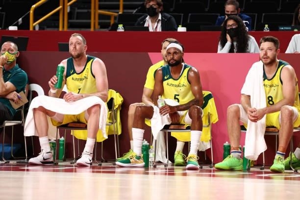 Joe Ingles of the Australia Men's National Team and Patty Mills of the Australia Men's National Team look on during the 2020 Tokyo Olympics on July...