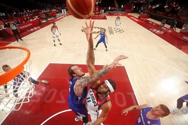 S Javale Mc Gee goes to the basket past Czech Republic's Ondrej Balvin in the men's preliminary round group A basketball match between USA and Czech...