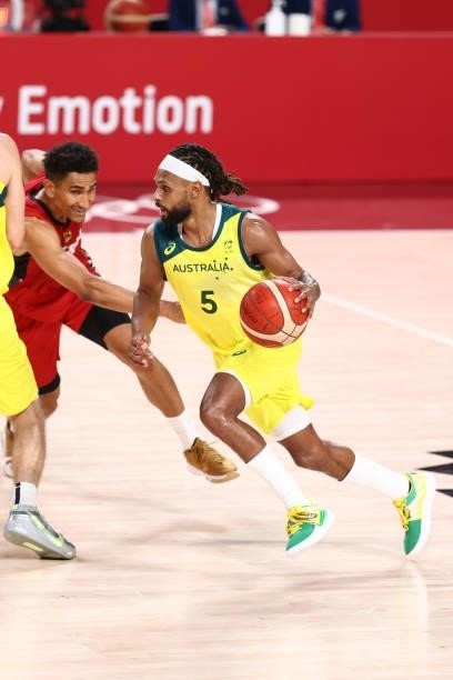 Patty Mills of the Australia Men's National Team dribbles the ball during the game against the Germany Men's National Team during the 2020 Tokyo...