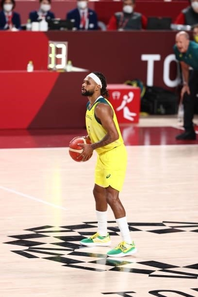 Patty Mills of the Australia Men's National Team dribbles the ball during the game against the Germany Men's National Team during the 2020 Tokyo...