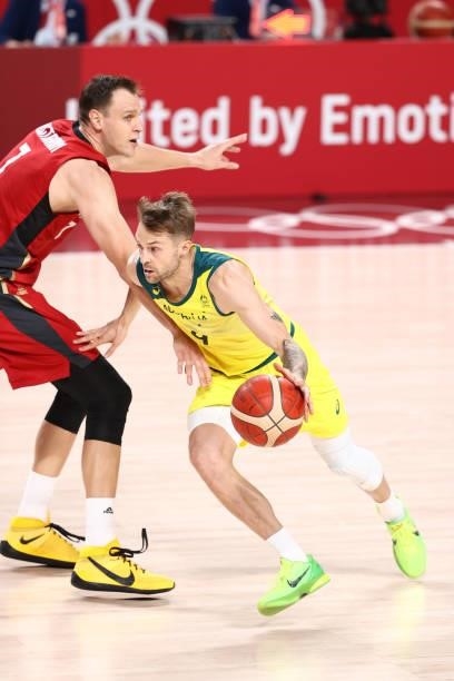 Nathan Sobey of the Australia Men's National Team dribbles the ball during the game against the Germany Men's National Team during the 2020 Tokyo...