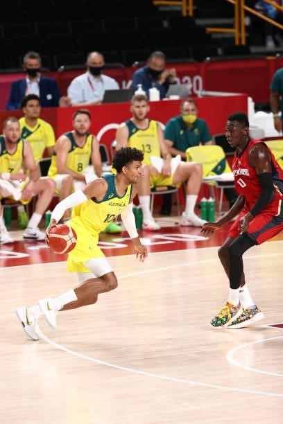 Matisse Thybulle of the Australia Men's National Team dribbles the ball during the game against the Germany Men's National Team during the 2020 Tokyo...