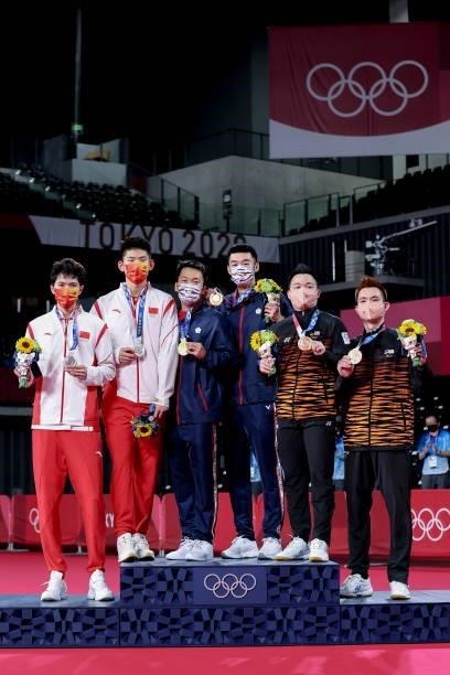 Silver medalists Li Jun Hui and Liu Yu Chen of Team China, gold medalists Lee Yang and Wang Chi-Lin of Team Chinese Taipei and bronze medalists Aaron...