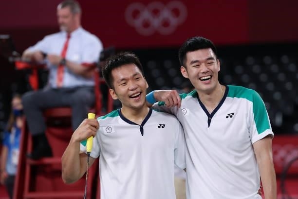 Lee Yang and Wang Chi-Lin of Team Chinese Taipei celebrate as they win against Li Jun Hui and Liu Yu Chen of Team China during the Men's Doubles Gold...