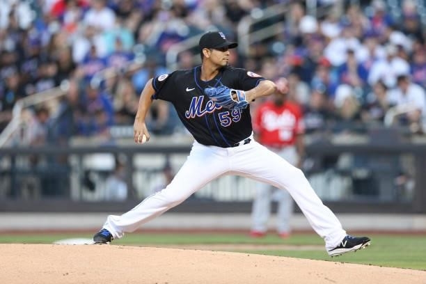 Carlos Carrasco of the New York Mets pitches during the game between the Cincinnati Reds and the New York Mets at Citi Field on Friday, July 30, 2021...