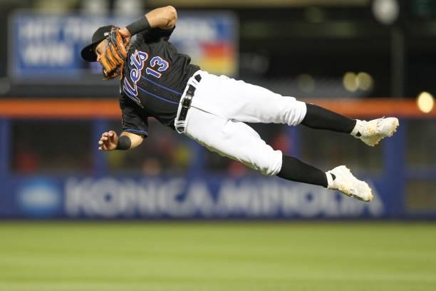 Luis Guillorme of the New York Mets makes a catch during the game between the Cincinnati Reds and the New York Mets at Citi Field on Friday, July 30,...