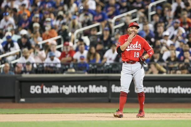Joey Votto of the Cincinnati Reds reacts during the game between the Cincinnati Reds and the New York Mets at Citi Field on Friday, July 30, 2021 in...