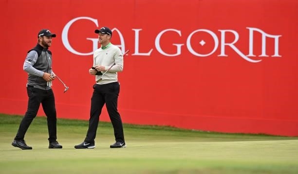 Jordan Smith of England and David Horsey of England on the 18th green after completing their rounds during Day Three of The ISPS HANDA World...
