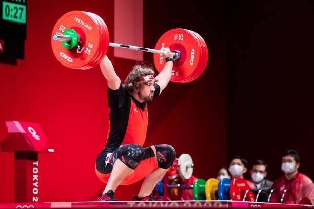 Boady Robertsantavy of Canada compete in the Men's 96kg Group B weightlifting competition on day eight of the Tokyo 2020 Olympic Games at Tokyo...