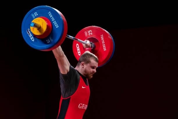 Anton Pliesnoi of Georgia compete in the Men's 96kg Group B weightlifting competition on day eight of the Tokyo 2020 Olympic Games at Tokyo...