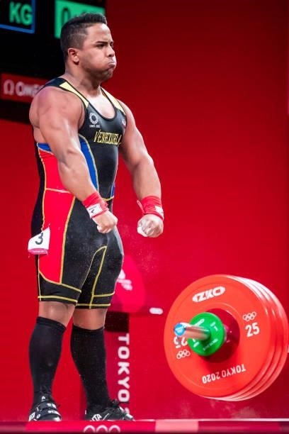 Keydomar Giovan Vallenilla Sanchez of Venezuela celebrates in the Men's 96kg Group B weightlifting competition on day eight of the Tokyo 2020 Olympic...