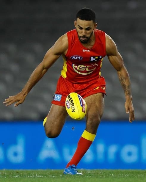 Touk Miller of the Suns in action during the 2021 AFL Round 20 match between the Gold Coast Suns and the Melbourne Demons at Marvel Stadium on August...