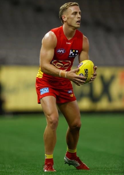 Darcy MacPherson of the Suns in action during the 2021 AFL Round 20 match between the Gold Coast Suns and the Melbourne Demons at Marvel Stadium on...