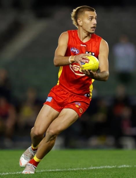 Debutant, Joel Jeffrey of the Suns in action during the 2021 AFL Round 20 match between the Gold Coast Suns and the Melbourne Demons at Marvel...