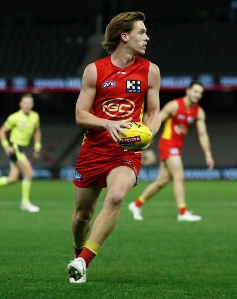 Noah Anderson of the Suns in action during the 2021 AFL Round 20 match between the Gold Coast Suns and the Melbourne Demons at Marvel Stadium on...