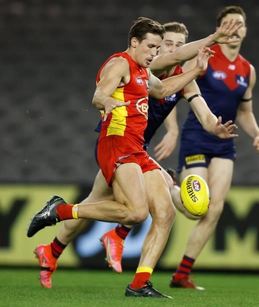 David Swallow of the Suns kicks the ball during the 2021 AFL Round 20 match between the Gold Coast Suns and the Melbourne Demons at Marvel Stadium on...